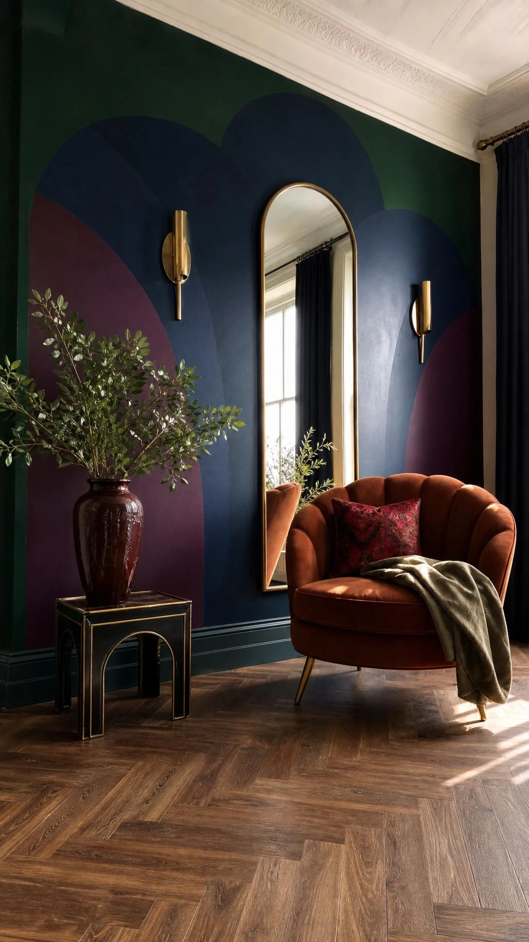 Low-angle living room view with Art Deco jewel tone paint: emerald wall, sapphire and plum fan arches above herringbone wood.