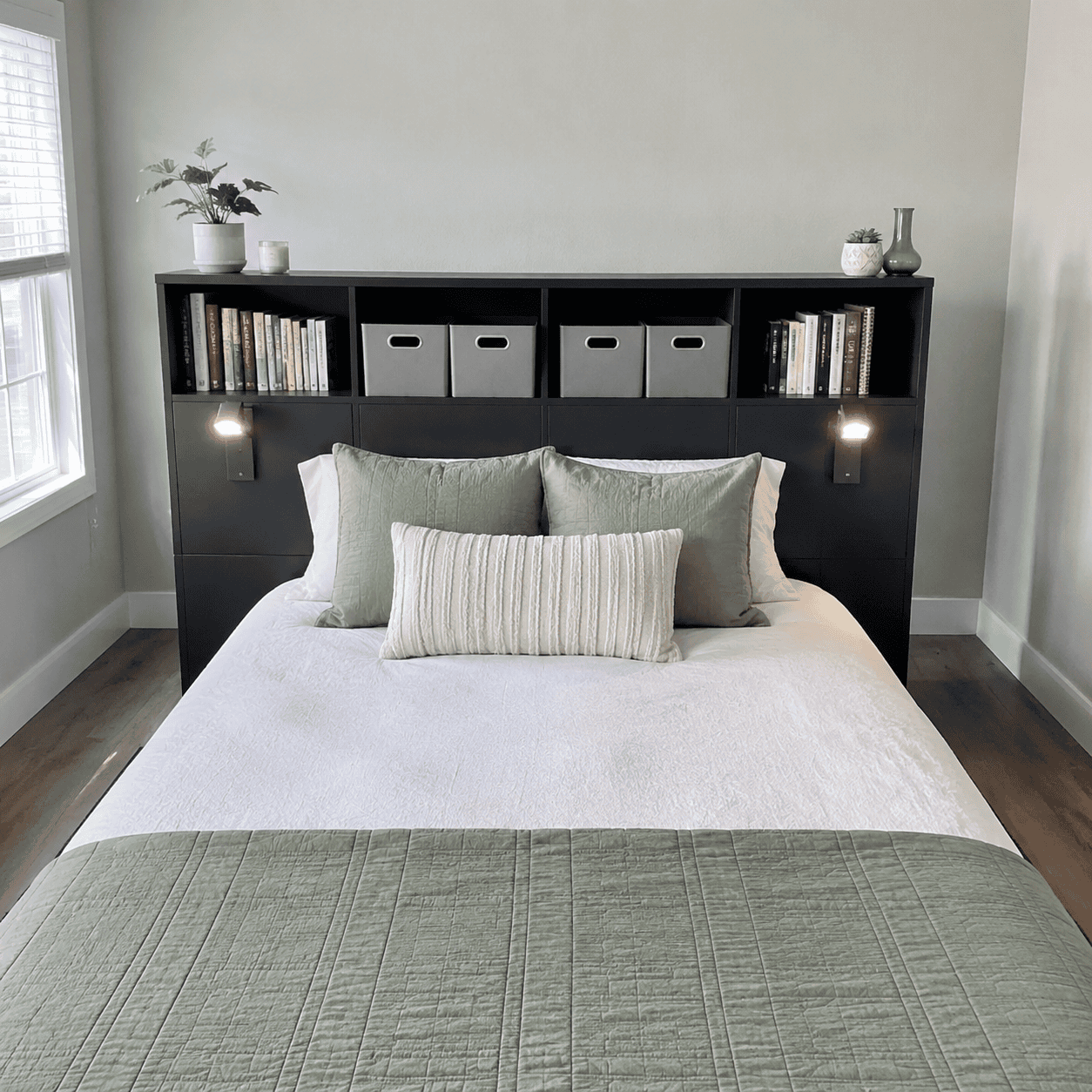 Bedroom storage headboard with shelves and reading lights